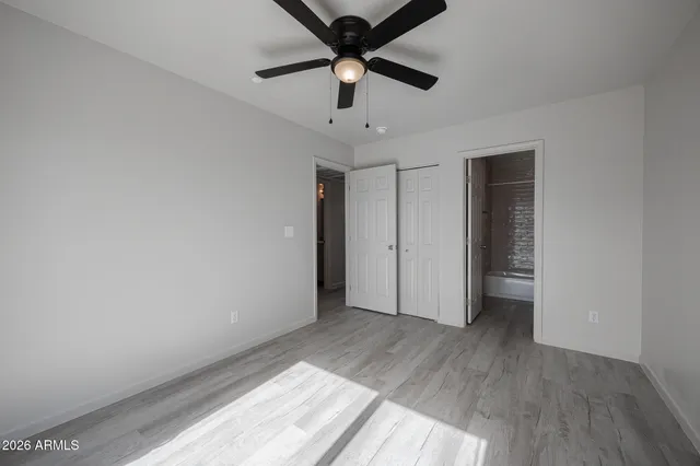 a view of an empty room and window