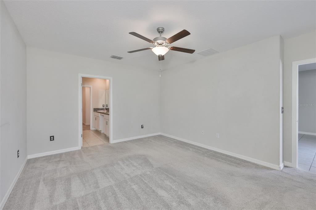 797 Olive Conch Street Ruskin, FL 33570 - Photo 17 of 53 wooden floor in an empty room