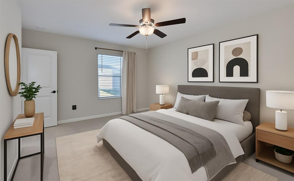 797 Olive Conch Street Ruskin, FL 33570 - Photo 18 of 53 a bedroom with a bed and a potted plant