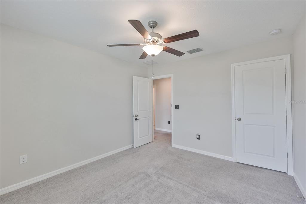 797 Olive Conch Street Ruskin, FL 33570 - Photo 24 of 53 a view of an empty room