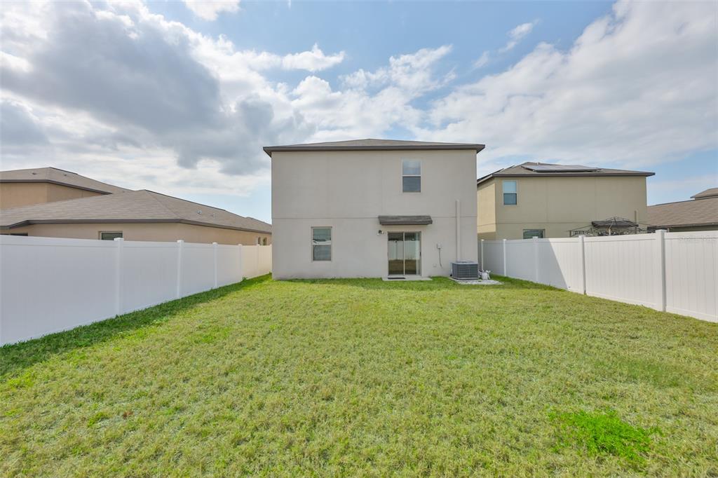 797 Olive Conch Street Ruskin, FL 33570 - Photo 40 of 53 a view of a backyard