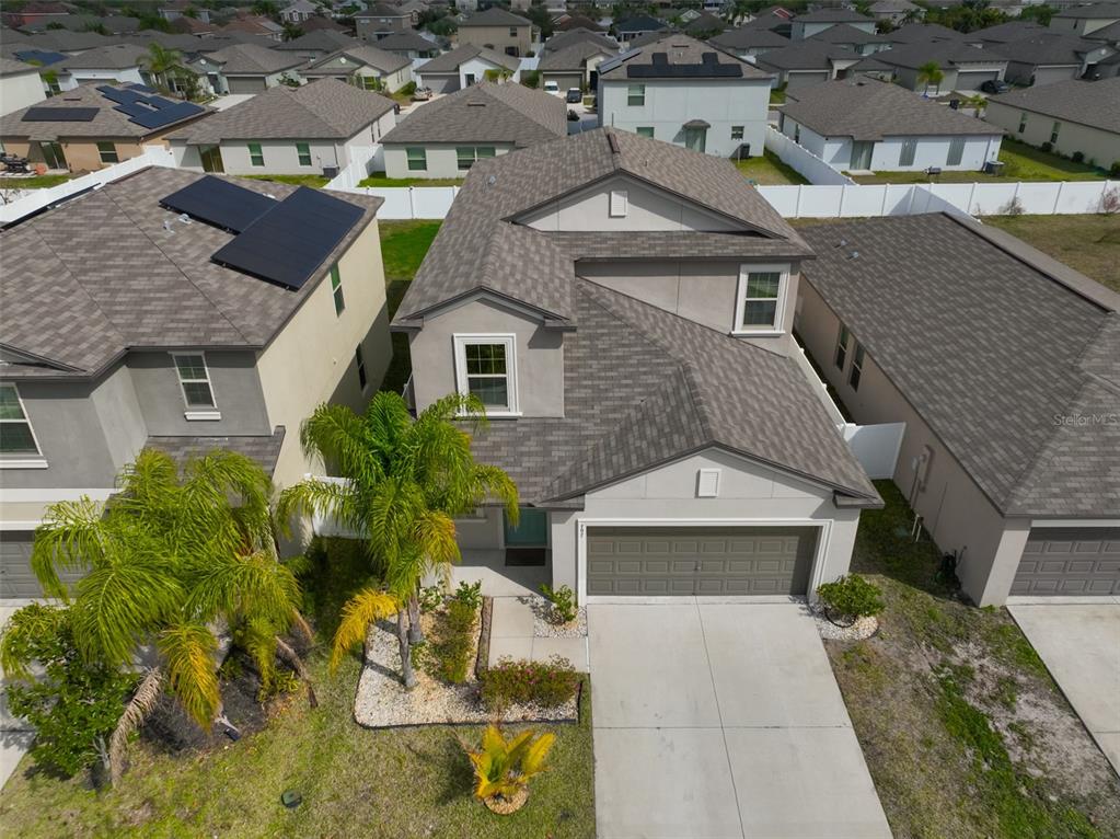 797 Olive Conch Street Ruskin, FL 33570 - Photo 45 of 53 an aerial view of a house with swimming pool and big yard