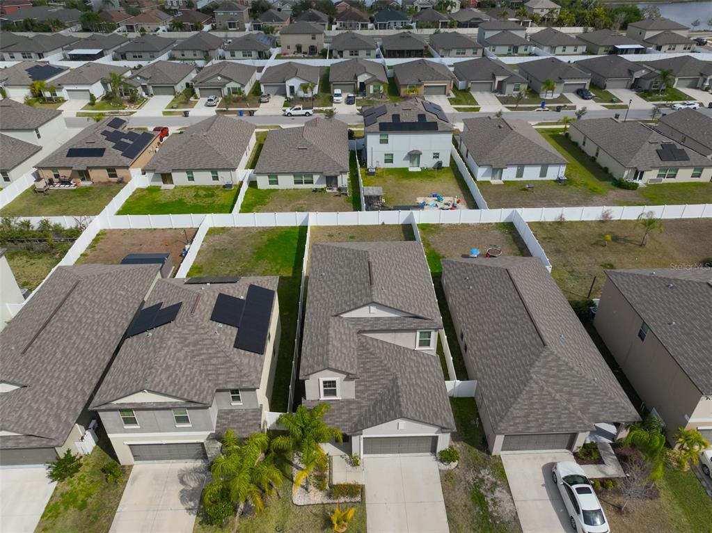 797 Olive Conch Street Ruskin, FL 33570 - Photo 46 of 53 an aerial view of residential houses with outdoor space