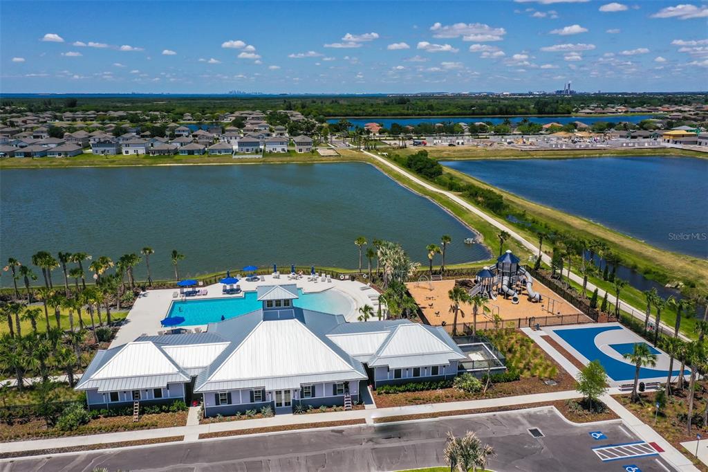 797 Olive Conch Street Ruskin, FL 33570 - Photo 51 of 53 an aerial view of a house with a lake view