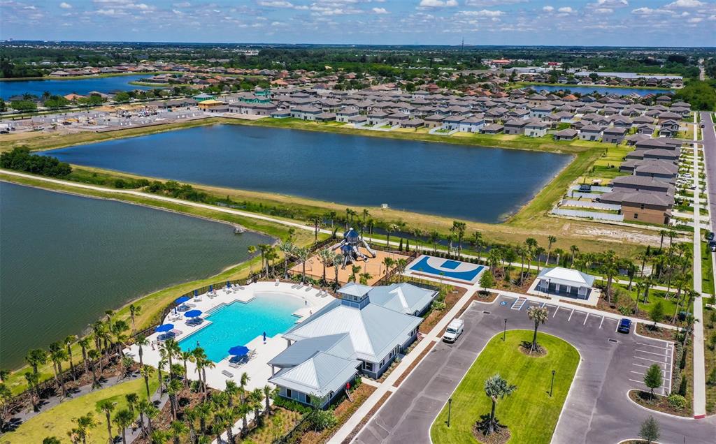 797 Olive Conch Street Ruskin, FL 33570 - Photo 52 of 53 an aerial view of a swimming pool and outdoor space