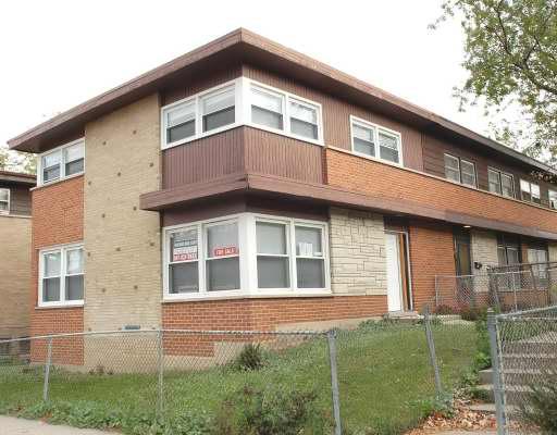 2019 Georgetown Lane, Unit 2019 Waukegan, IL 60085 - Photo 1 of 1 a large brick building with a large windows