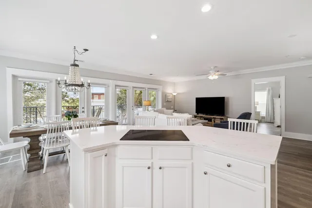 a kitchen with a sink and a large window
