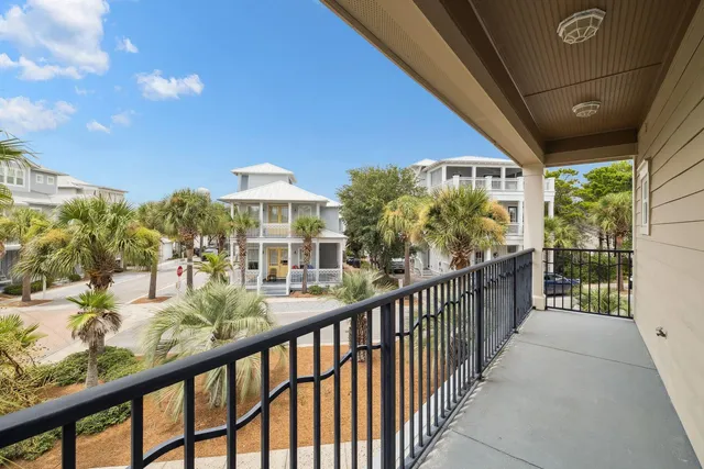 a view of a porch and garden