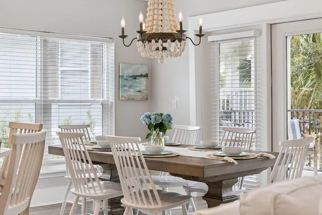 a view of a dining room with furniture window and outside view