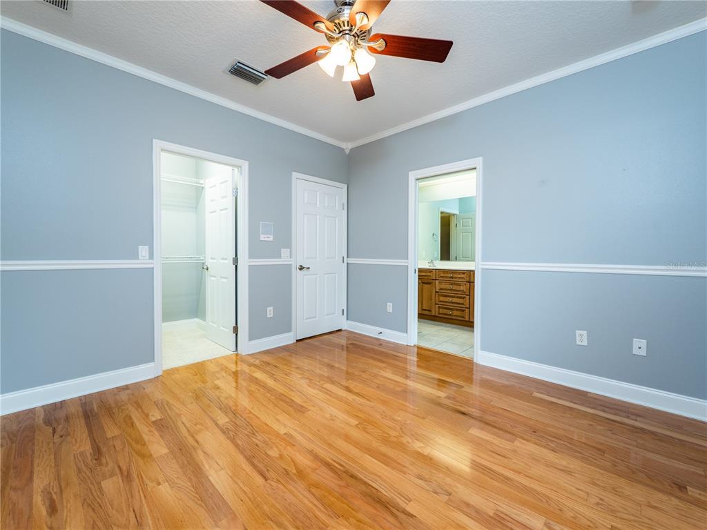 1945 Southwest 40th Place Ocala, FL 34471 - Photo 21 of 31 a view of empty room with window and ceiling fan