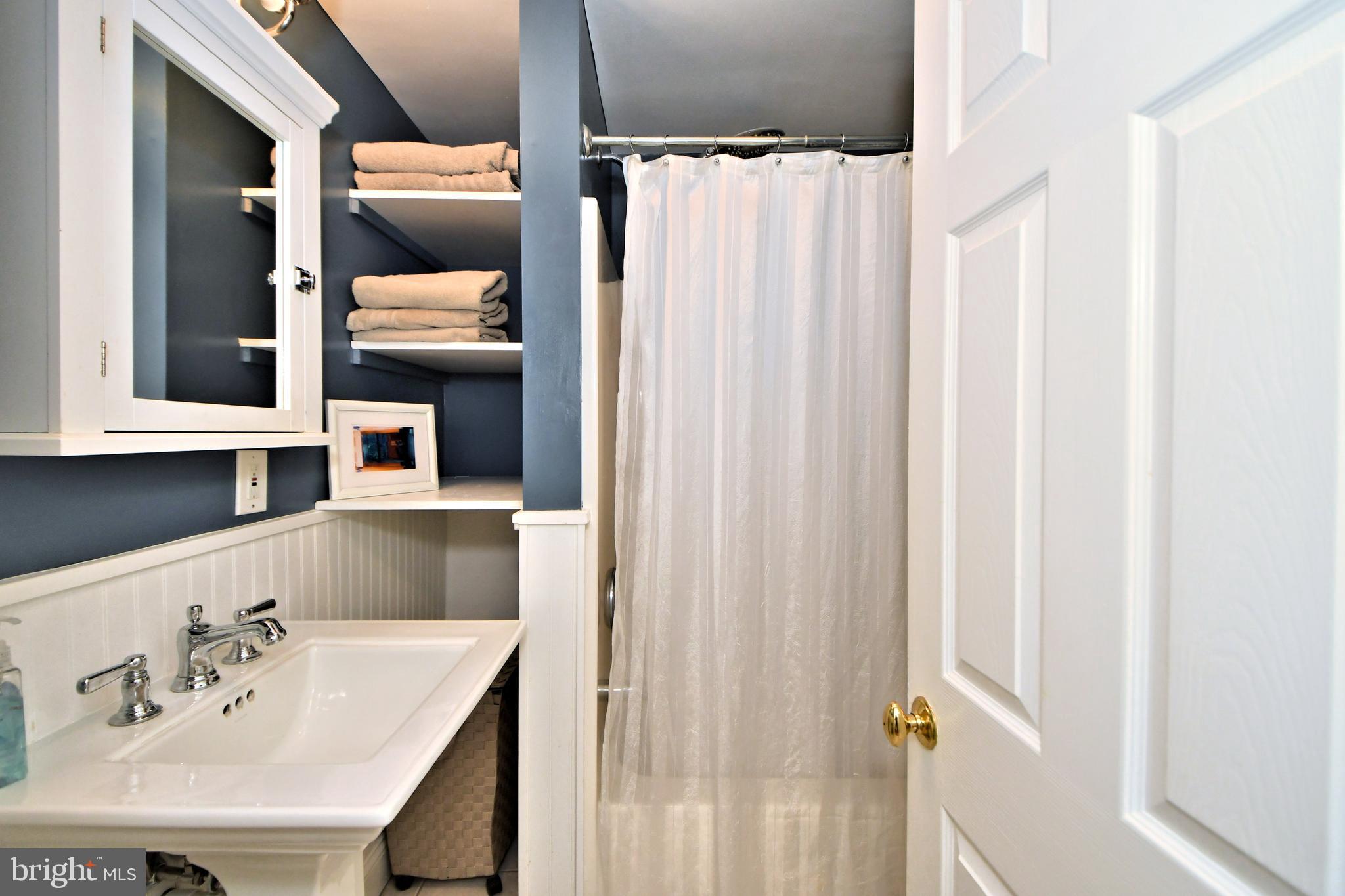 405 Crest Road Oreland, PA 19075 - Photo 21 of 43 1st floor full bath with stall shower