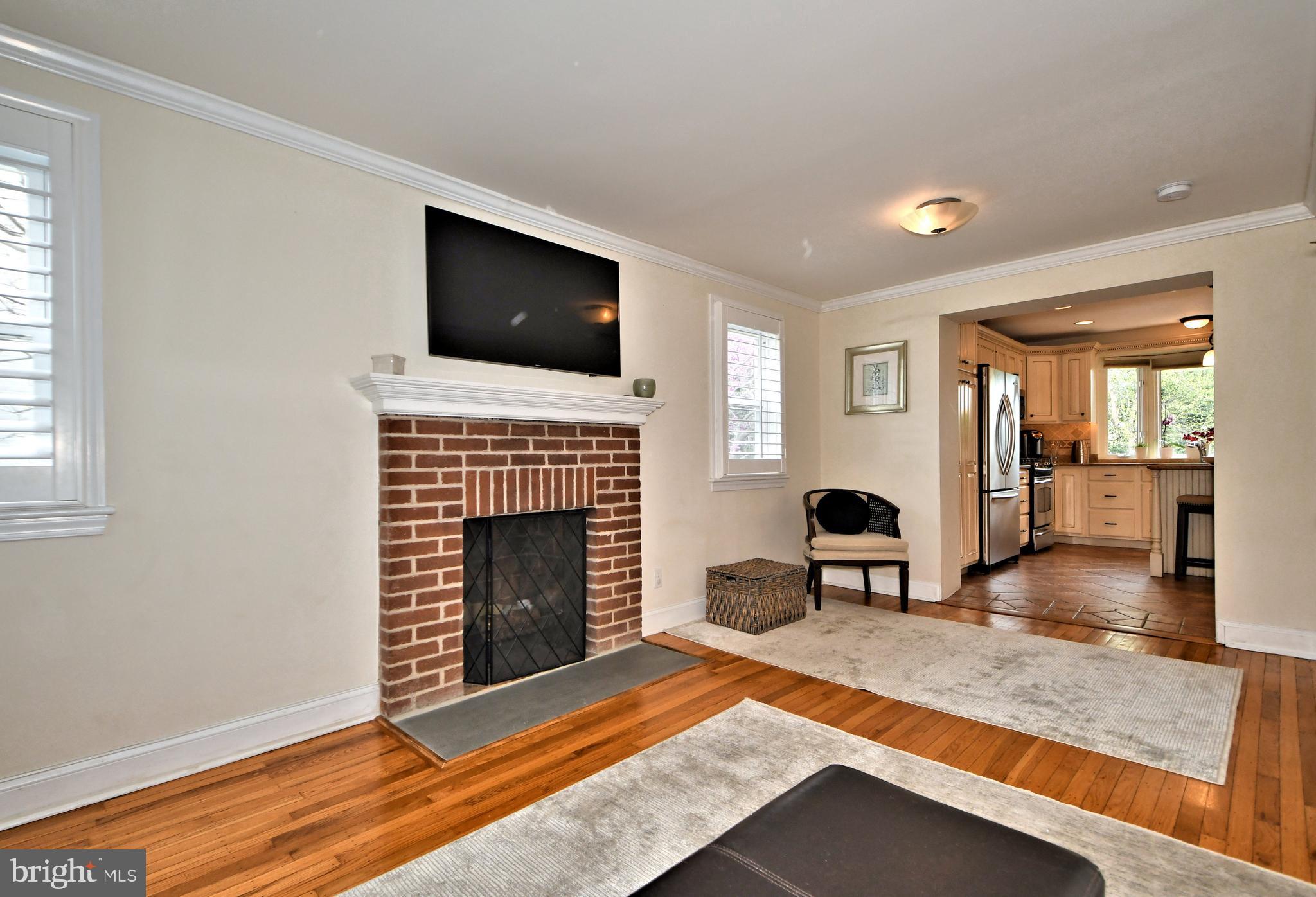 405 Crest Road Oreland, PA 19075 - Photo 6 of 43 Fireplace in living room