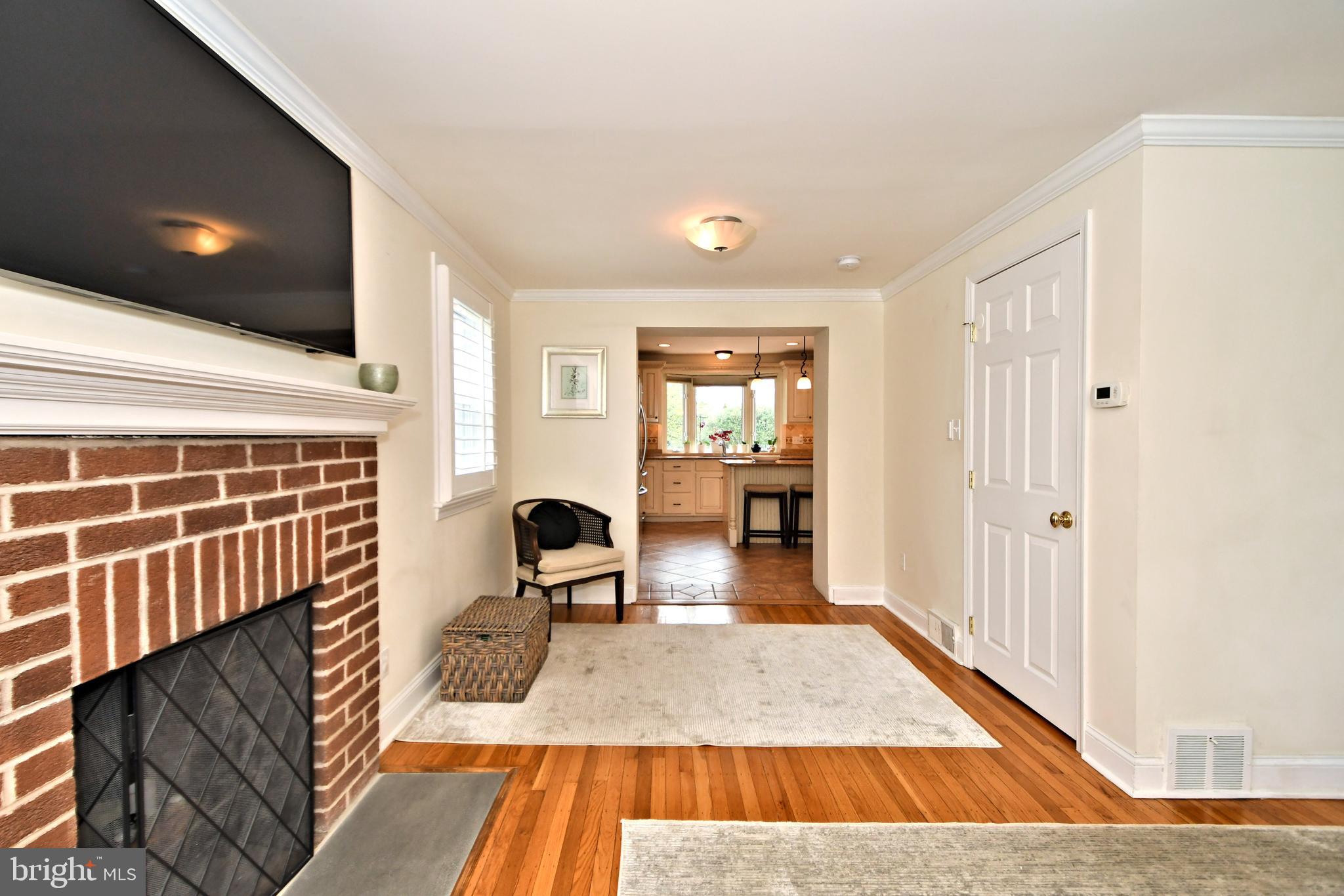 405 Crest Road Oreland, PA 19075 - Photo 8 of 43 Living room looking towards kitchen
