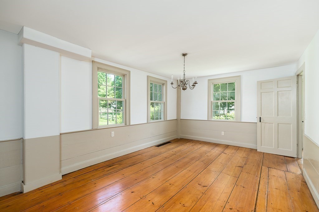 5 Middleton Road Boxford, MA 01921 - Photo 13 of 41 a view of empty room with wooden floor and fan