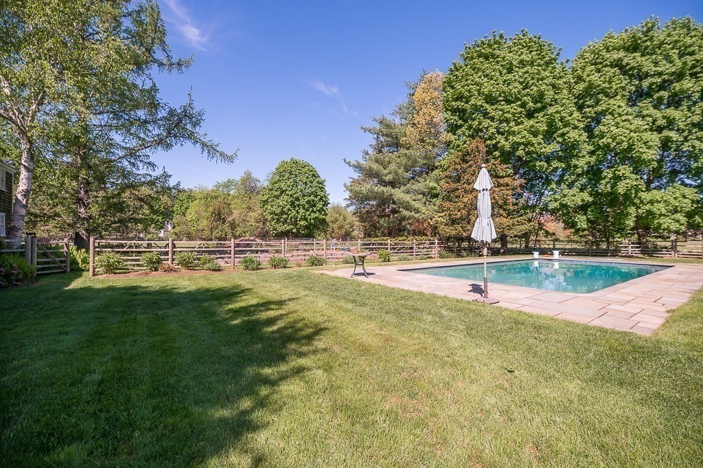 5 Middleton Road Boxford, MA 01921 - Photo 28 of 41 a view of a swimming pool with an outdoor space and seating area