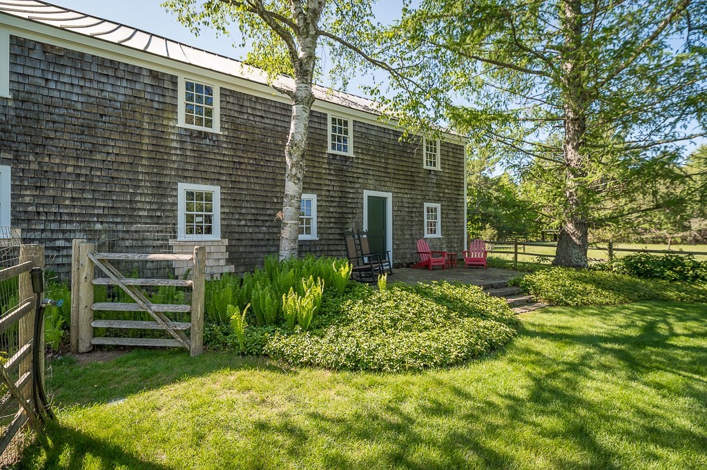 5 Middleton Road Boxford, MA 01921 - Photo 40 of 41 a view of a backyard with plants and large trees