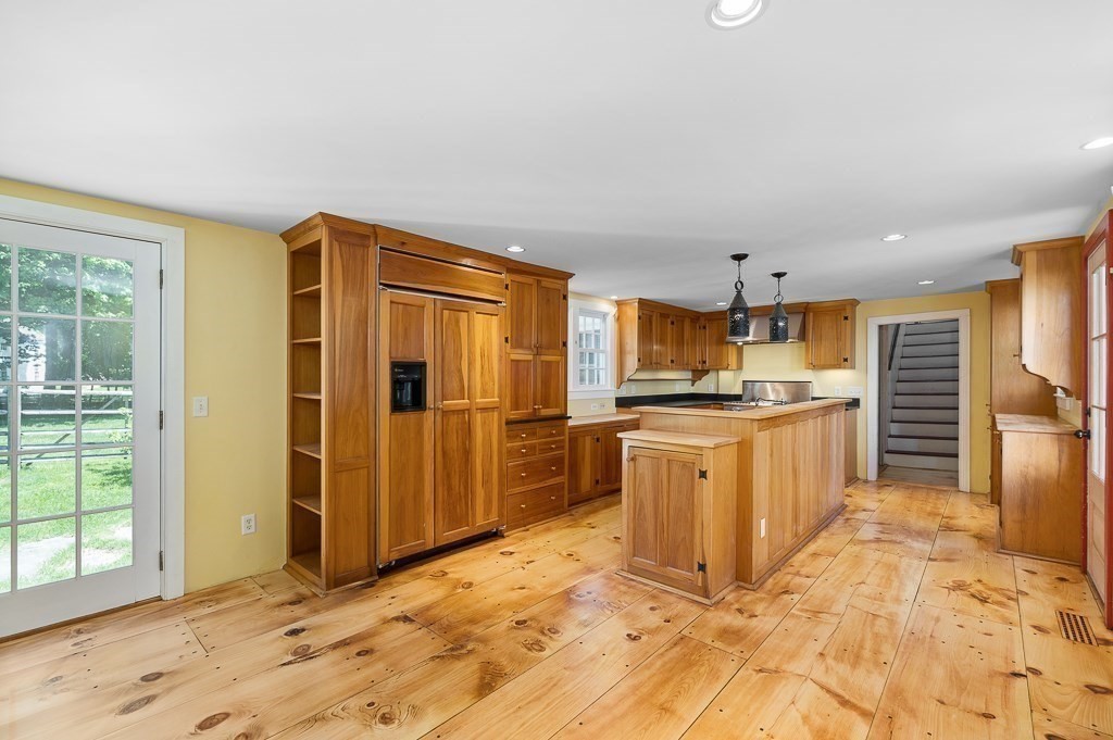 5 Middleton Road Boxford, MA 01921 - Photo 5 of 41 a view of kitchen with stainless steel appliances kitchen island granite countertop refrigerator stove top oven and sink