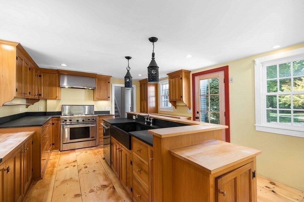 5 Middleton Road Boxford, MA 01921 - Photo 7 of 41 a kitchen with stainless steel appliances a stove a sink a refrigerator and windows