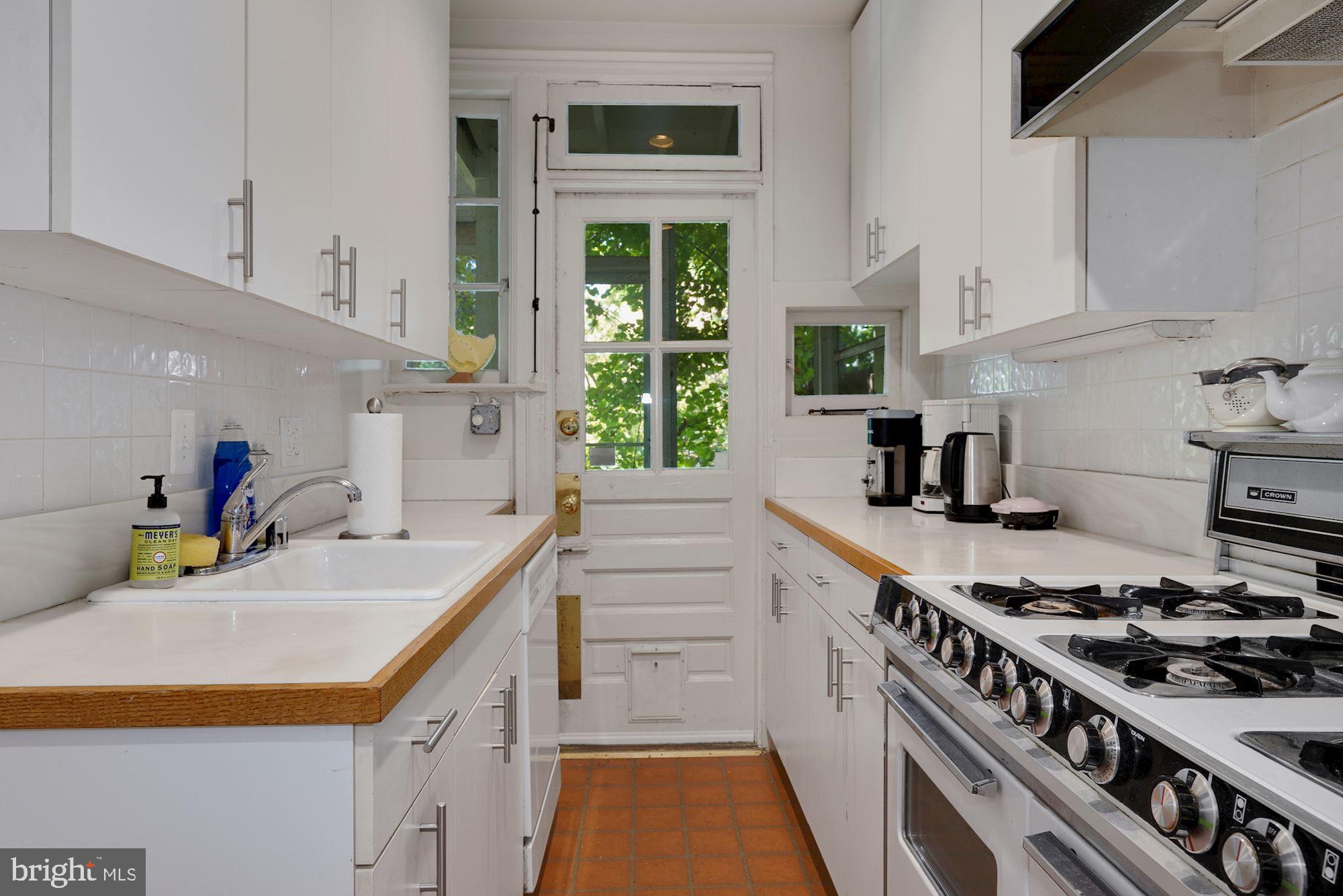 3702 R Street Northwest Washington, DC 20007 - Photo 7 of 32 Nice kitchen leading to a screen porch & backyard