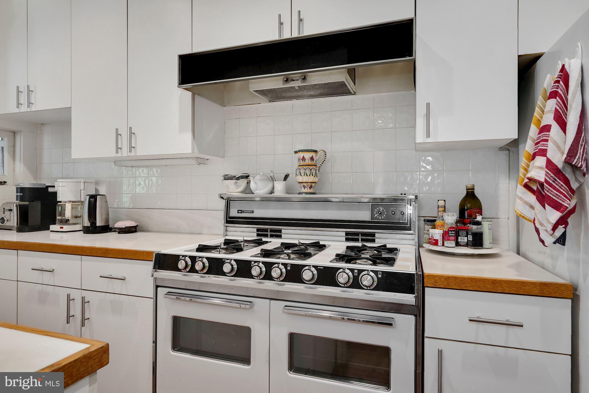 3702 R Street Northwest Washington, DC 20007 - Photo 8 of 32 Nice kitchen leading to a screen porch & backyard