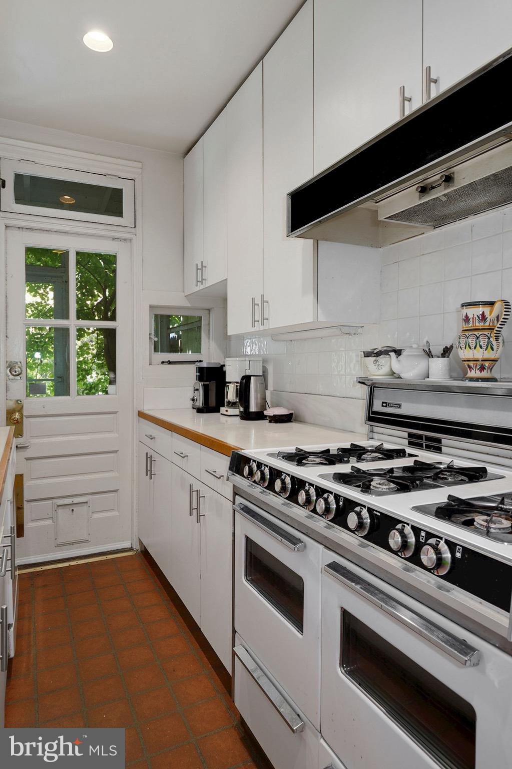 3702 R Street Northwest Washington, DC 20007 - Photo 9 of 32 Nice kitchen leading to a screen porch & backyard