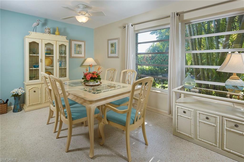 1829 Mandarin Road Naples, FL 34102 - Photo 5 of 14 a view of a dining room with furniture window and outside view