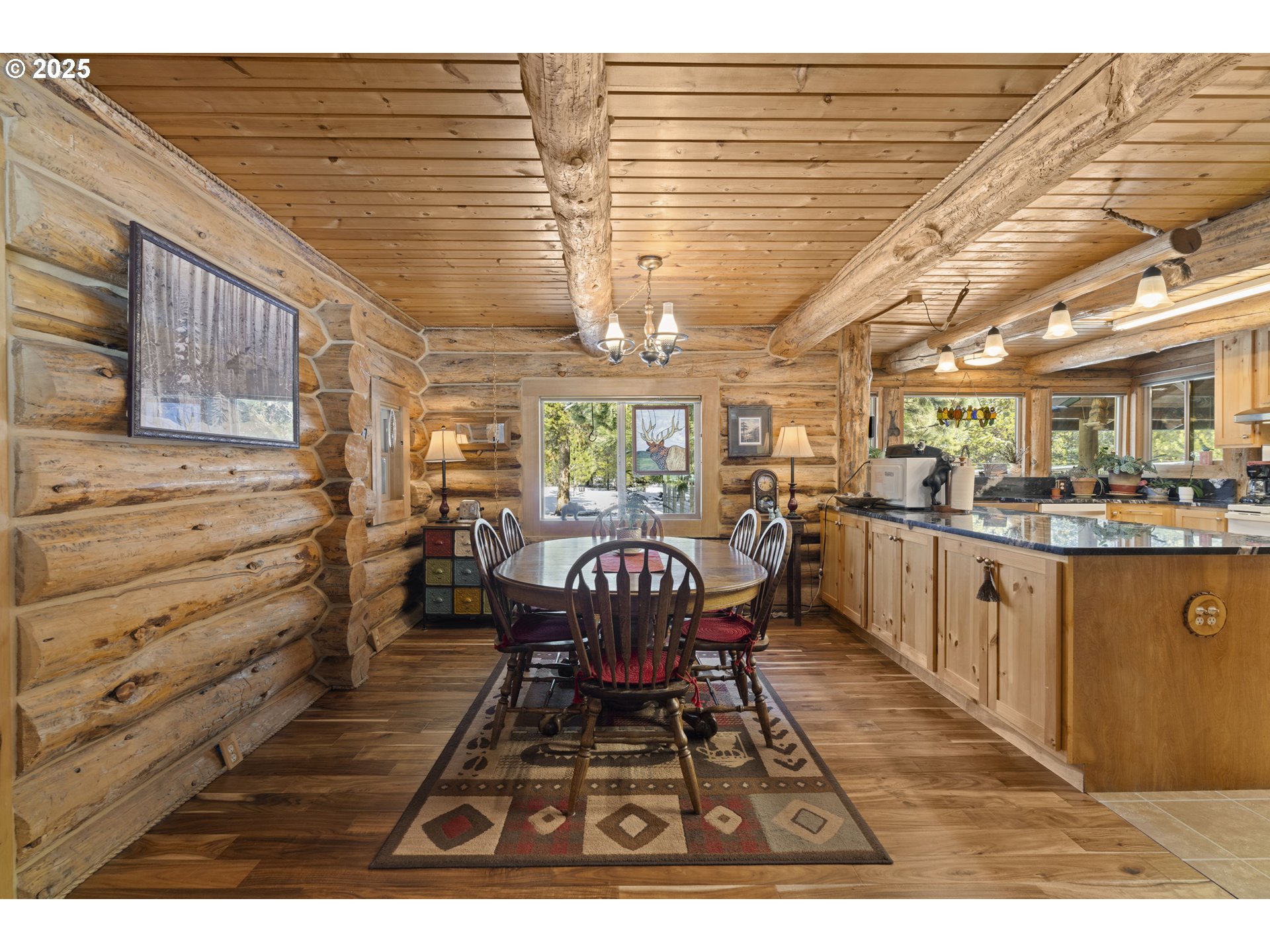 140643 Kamloop Lane Gilchrist, OR 97737 - Photo 11 of 36 a view of a dining room with furniture