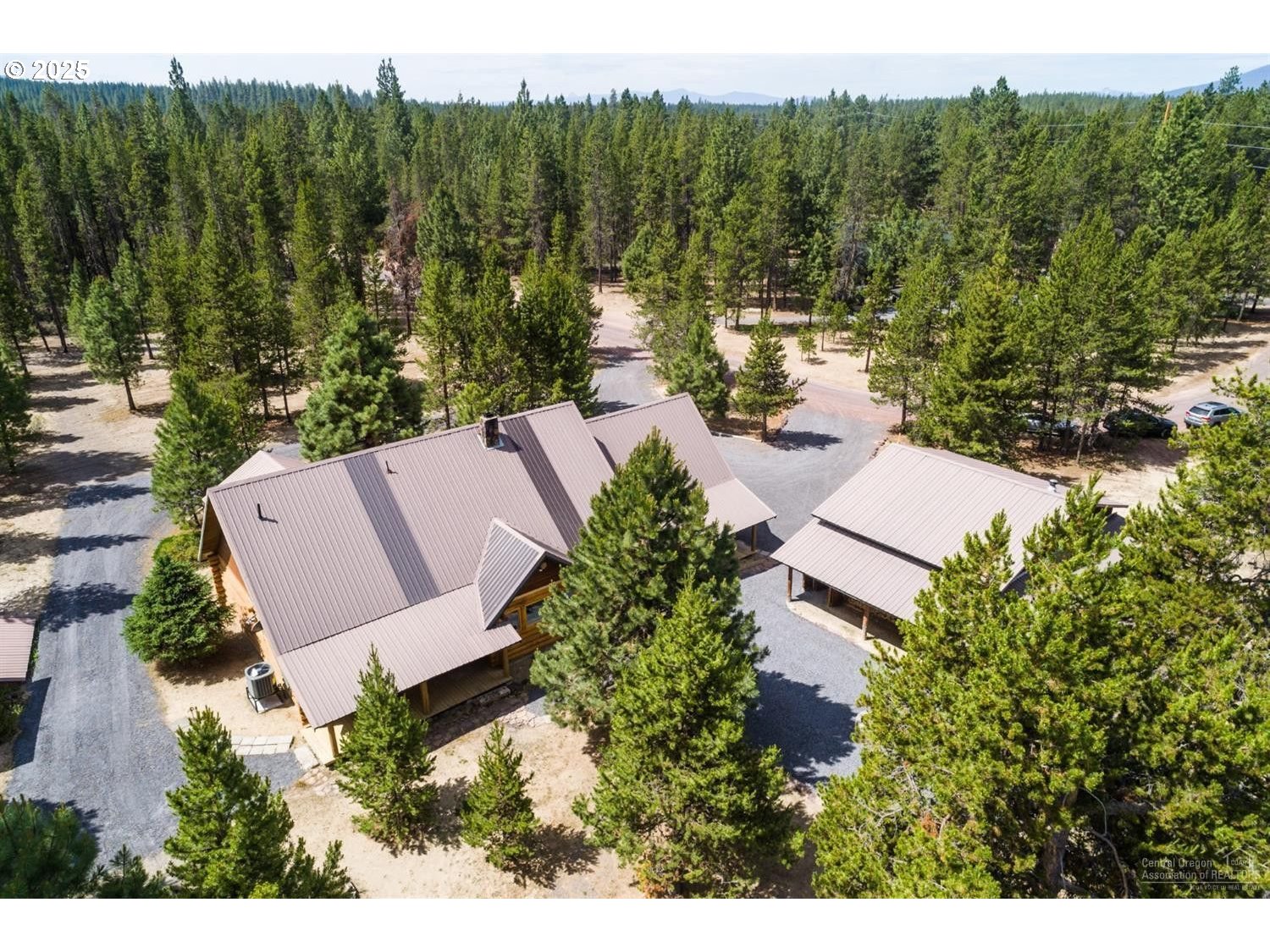 140643 Kamloop Lane Gilchrist, OR 97737 - Photo 36 of 36 an aerial view of a house with yard
