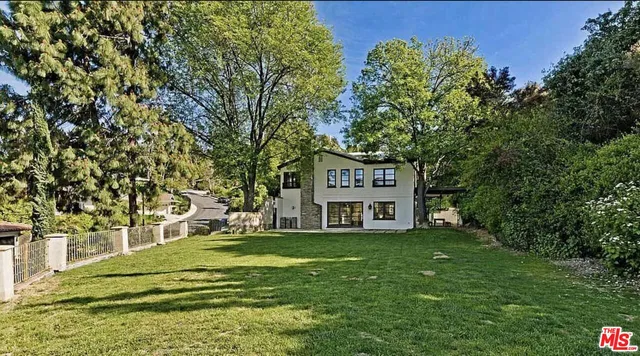 a view of a park with welcome board