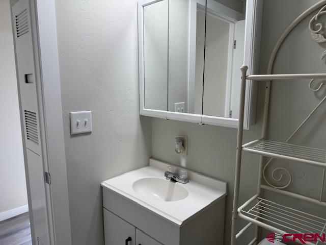 28260 Highway 160, Unit 81 Cortez, CO 81321 - Photo 18 of 20 a bathroom with a sink and a toilet