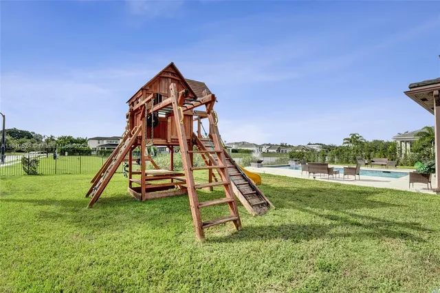 a view of a park with a slide