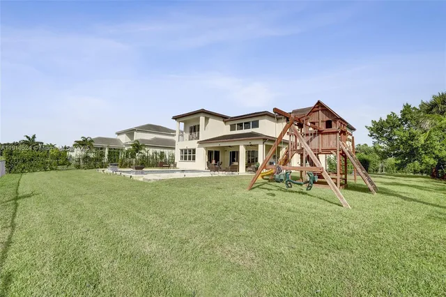 a house view with a garden space