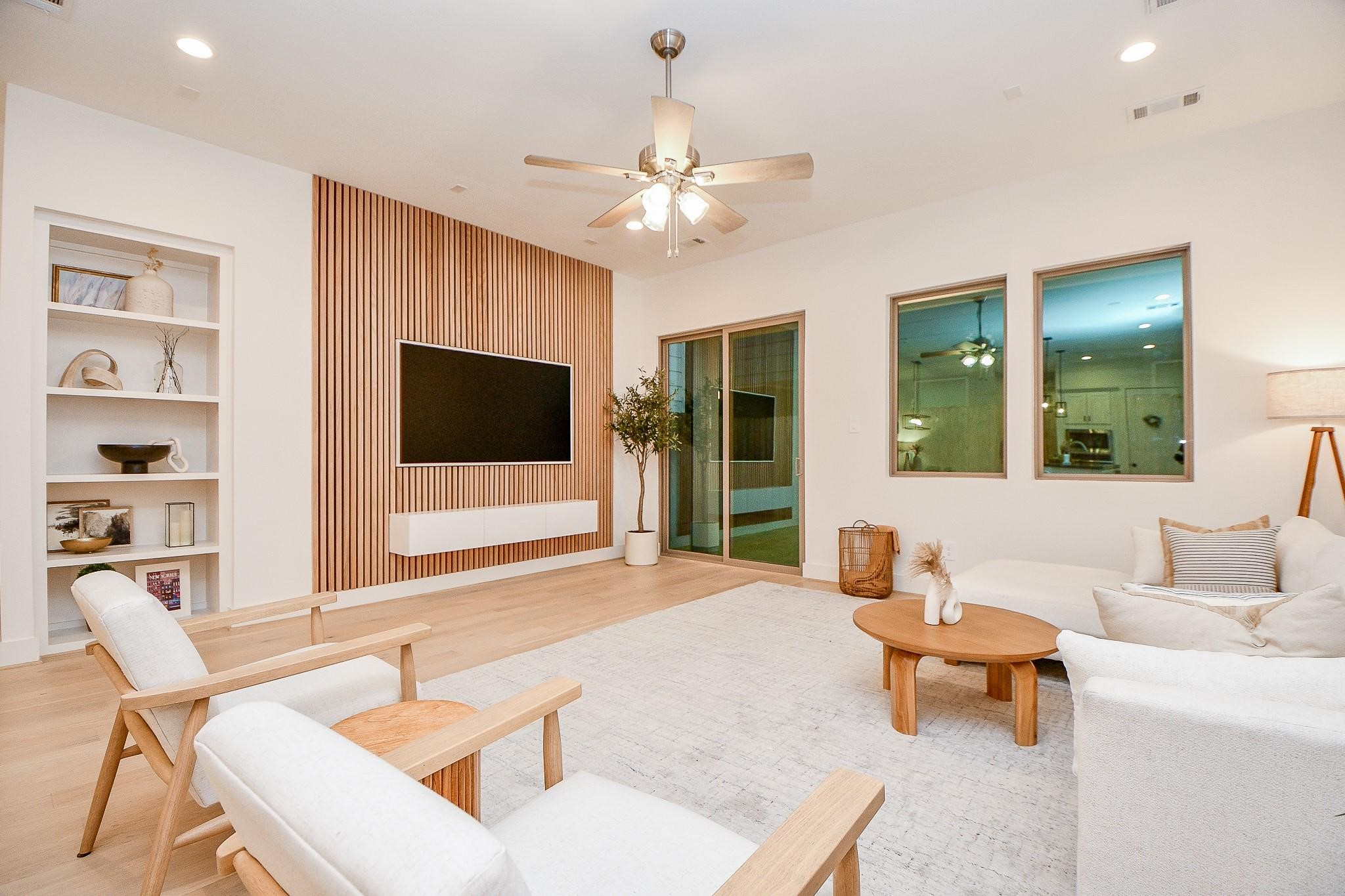 4403 Greeley Street Houston, TX 77006 - Photo 11 of 28 a living room with furniture and a flat screen tv