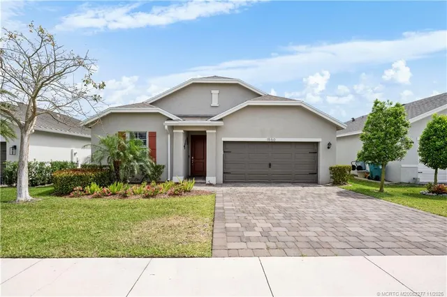 a house view with a garden space