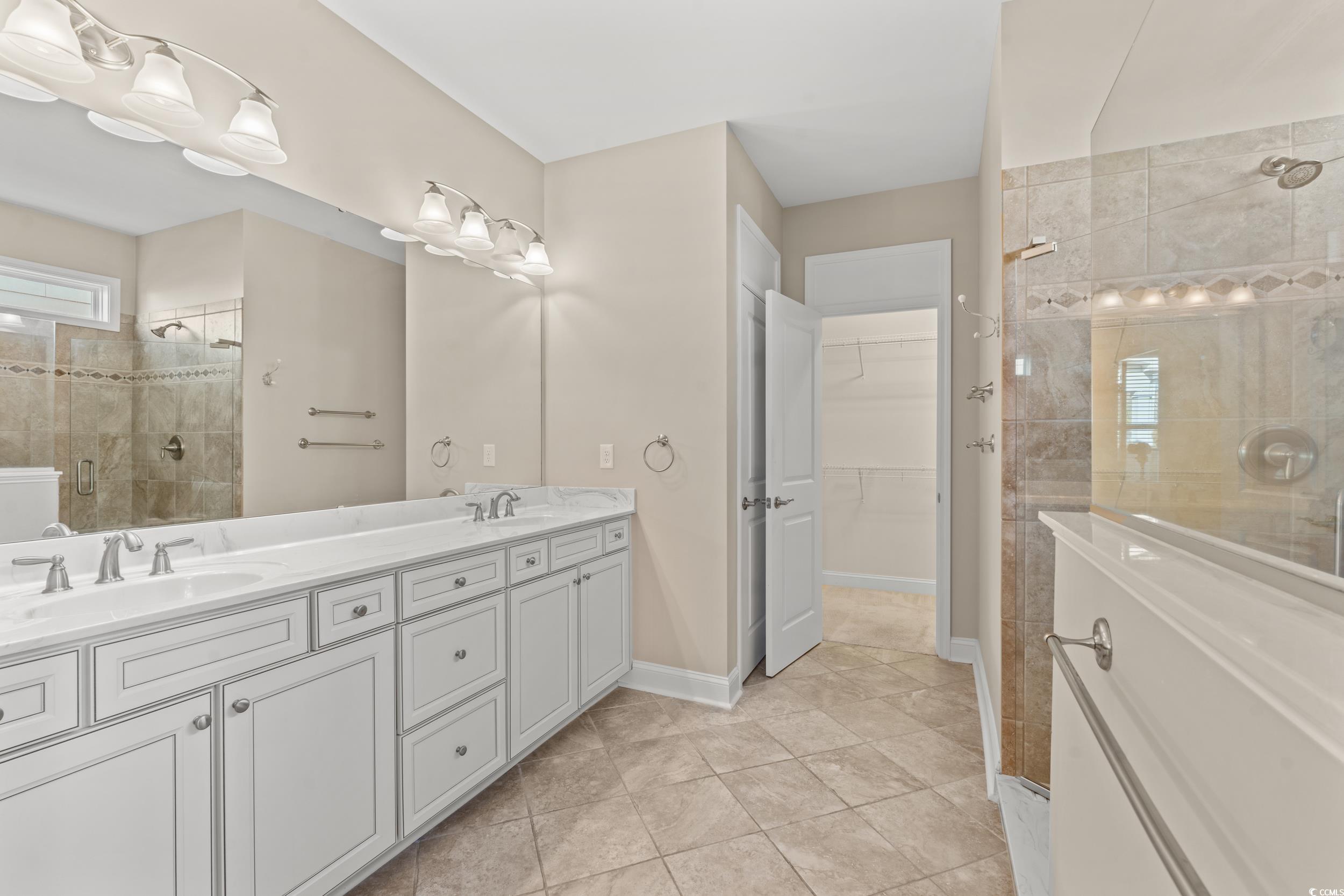2017 Silver Spring Lane Myrtle Beach, SC 29577 - Photo 16 of 40 Bathroom featuring vanity, tile patterned floors,