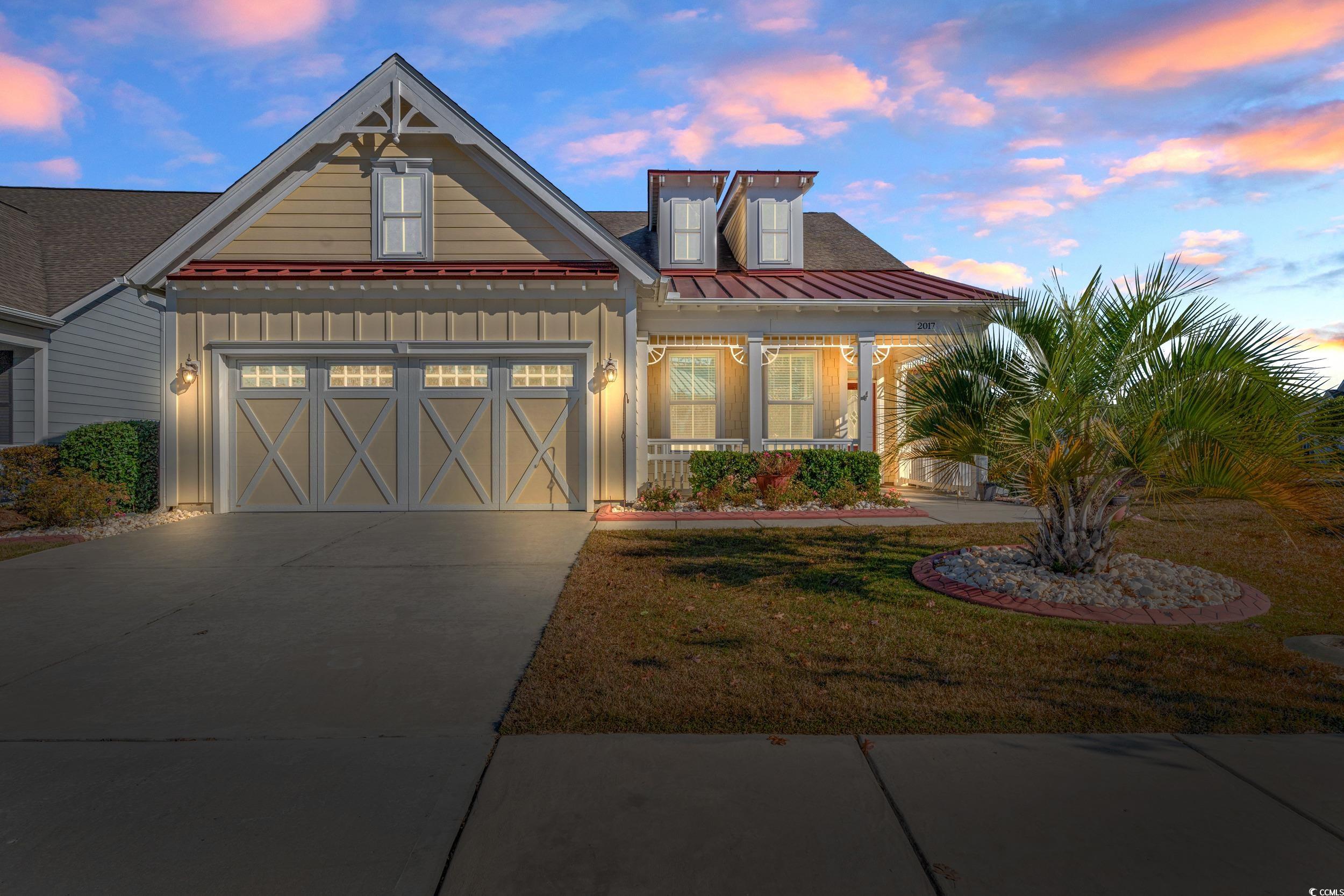 2017 Silver Spring Lane Myrtle Beach, SC 29577 - Photo 3 of 40 View of front of property with a yard and a garage