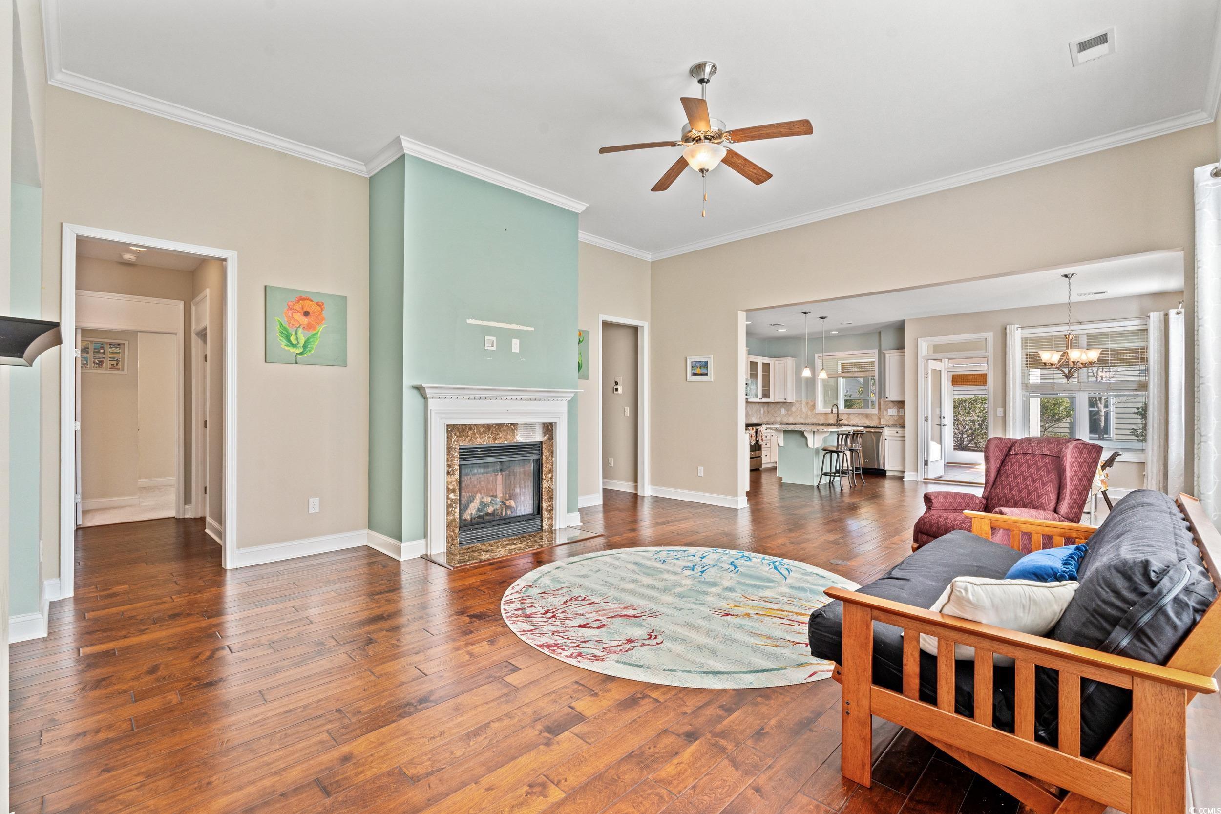 2017 Silver Spring Lane Myrtle Beach, SC 29577 - Photo 6 of 40 Living room featuring a fireplace, dark hardwood /