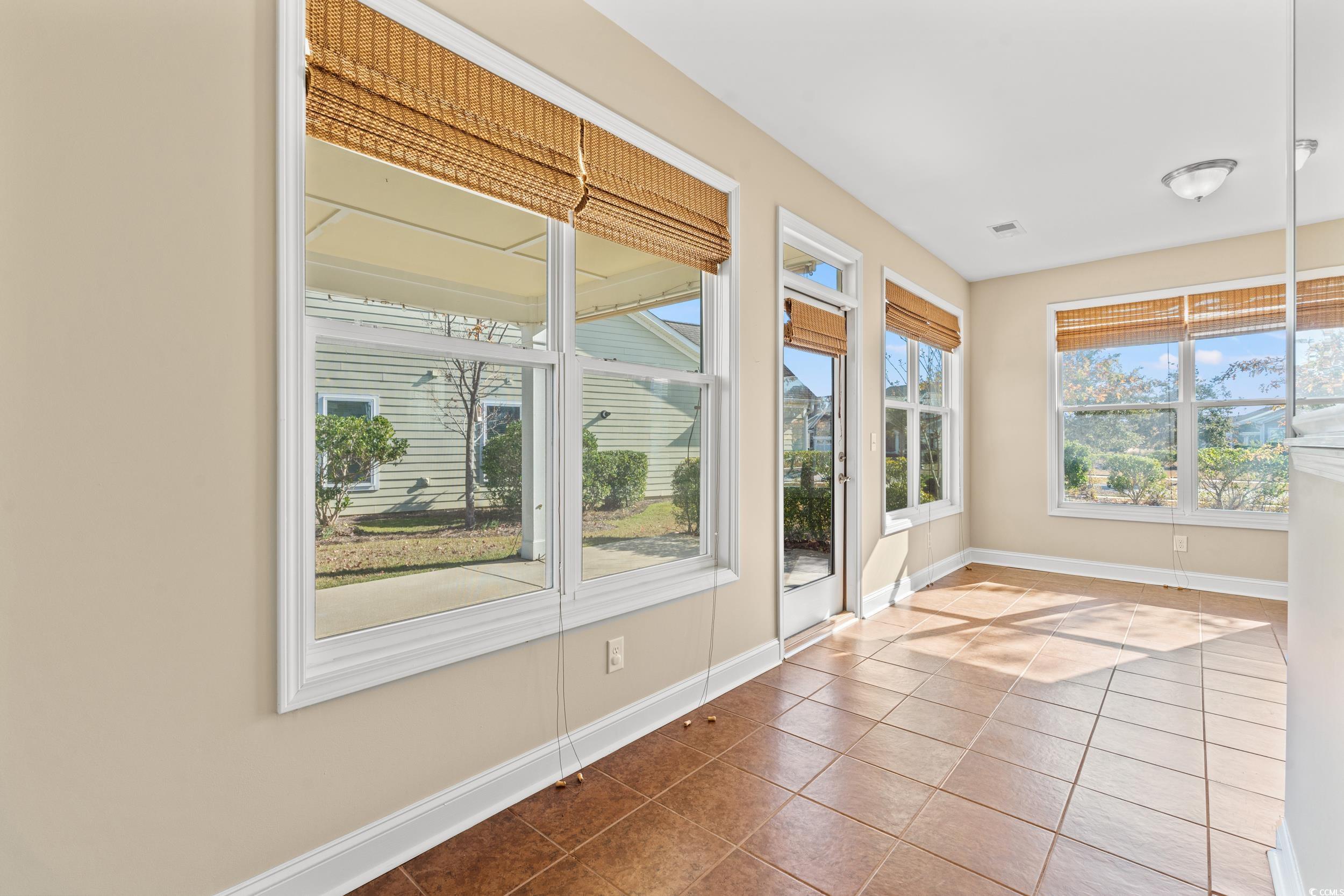 2017 Silver Spring Lane Myrtle Beach, SC 29577 - Photo 8 of 40 Unfurnished sunroom featuring plenty of natural li