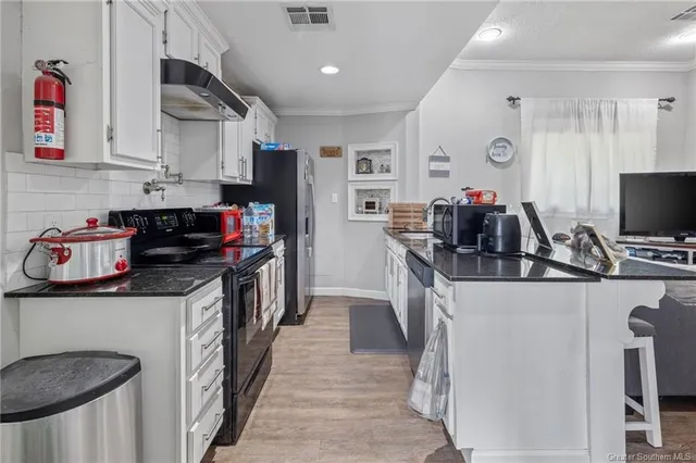 $695,000 | 720 You Winn Road, Lake Charles, LA 70611