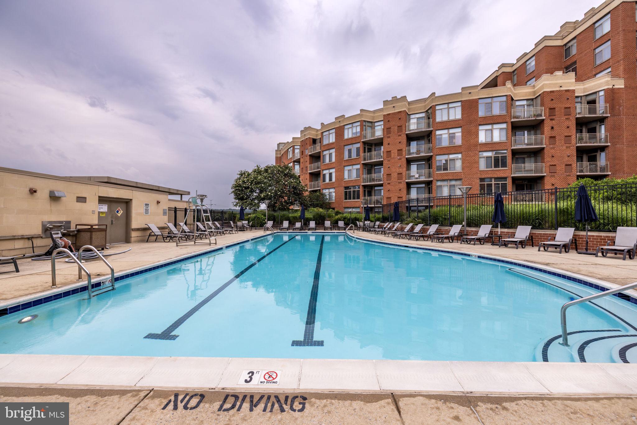 3600 South Glebe Road, Unit 409W Arlington, VA 22202 - Photo 24 of 34 a view of swimming pool with outdoor seating