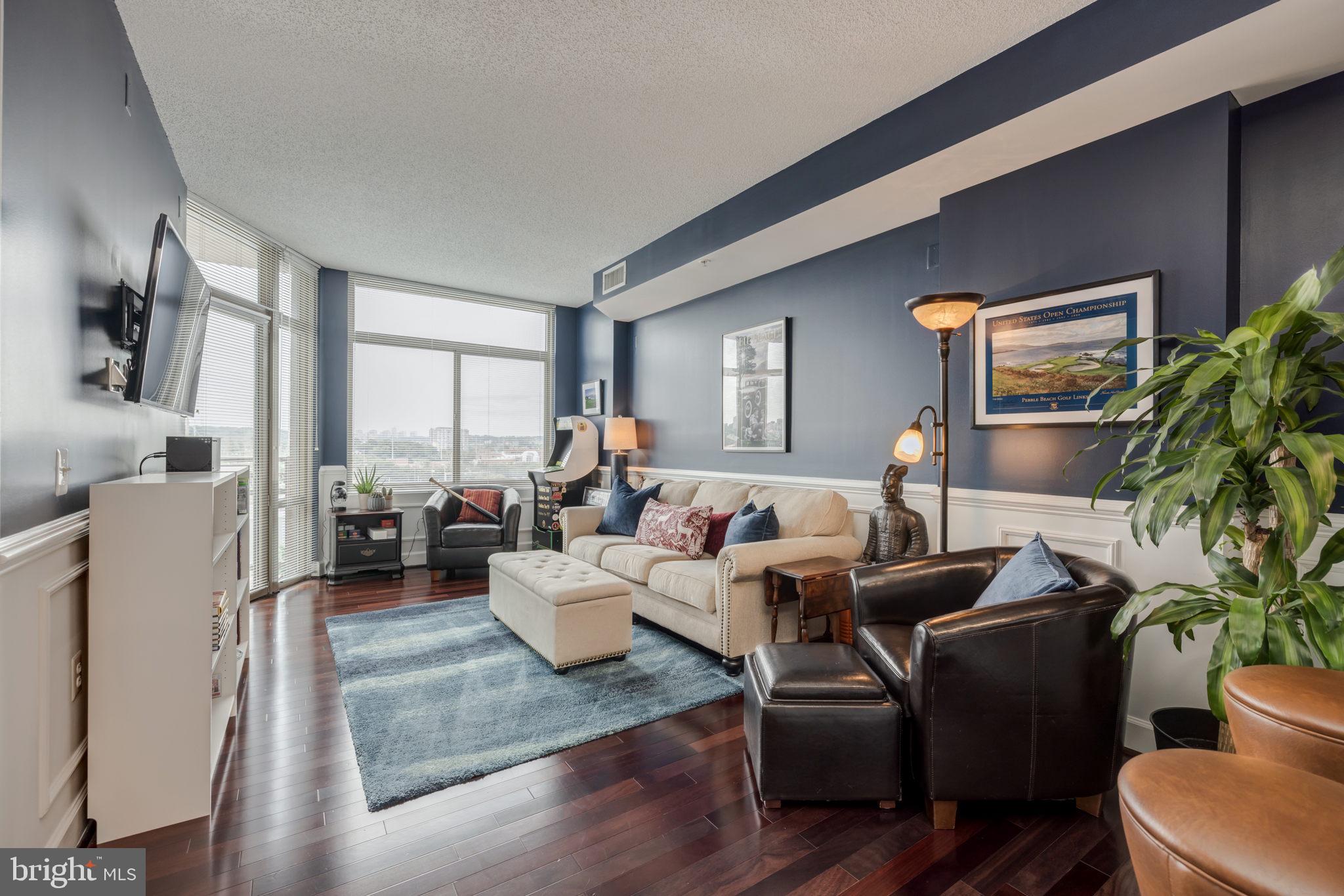 3600 South Glebe Road, Unit 409W Arlington, VA 22202 - Photo 6 of 34 a living room with furniture and a large window