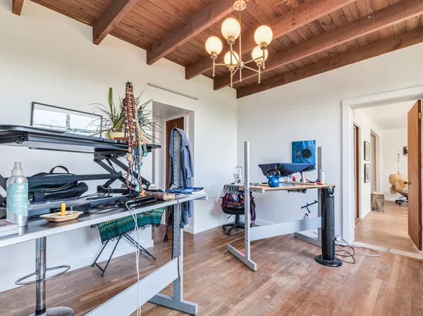 a view of a room with gym equipment
