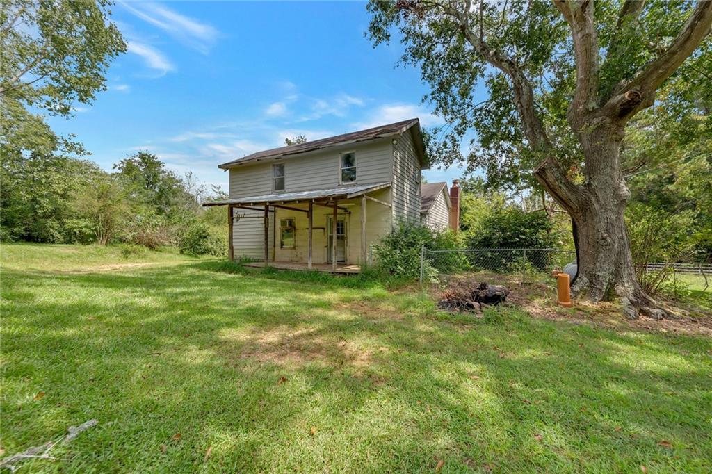 a house view with a garden space