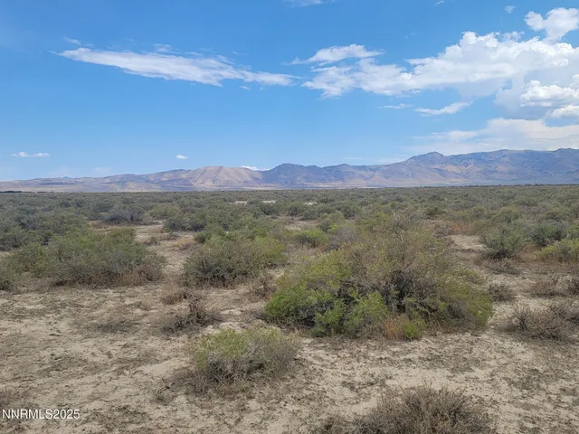 a view of an outdoor space and mountain view
