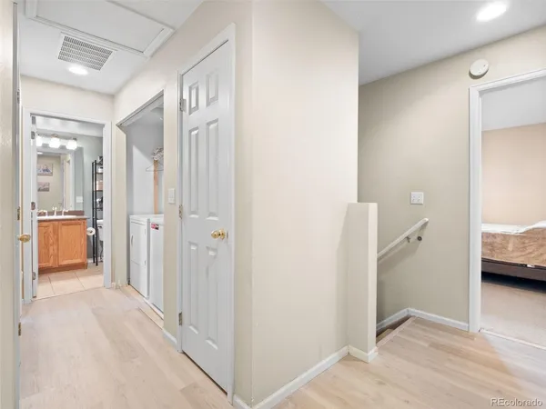 a view of a bathroom from the hallway