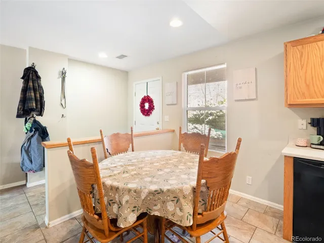 a view of a dining room with furniture