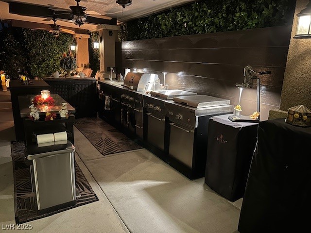 8175 Arville Street, Unit 210 Las Vegas, NV 89139 - Photo 7 of 36 View of patio / terrace with a ceiling fan and exterior kitchen