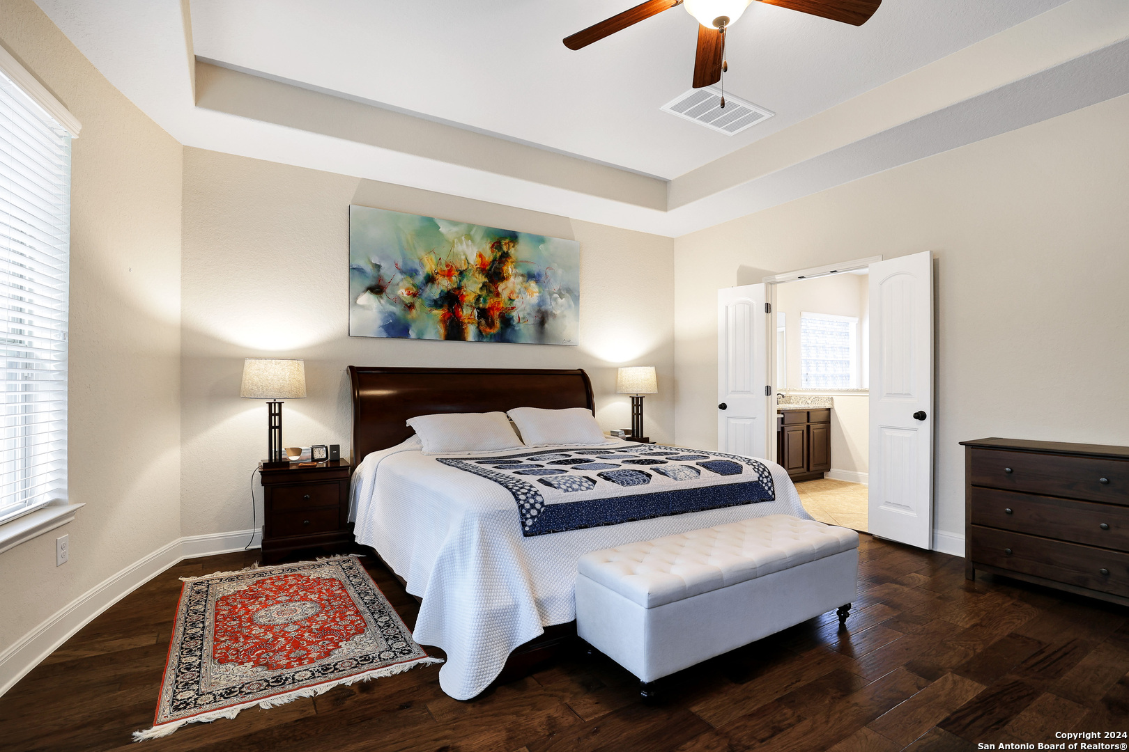 28565 Willis Ranch San Antonio, TX 78260 - Photo 22 of 39 a bedroom with a bed and wooden floor