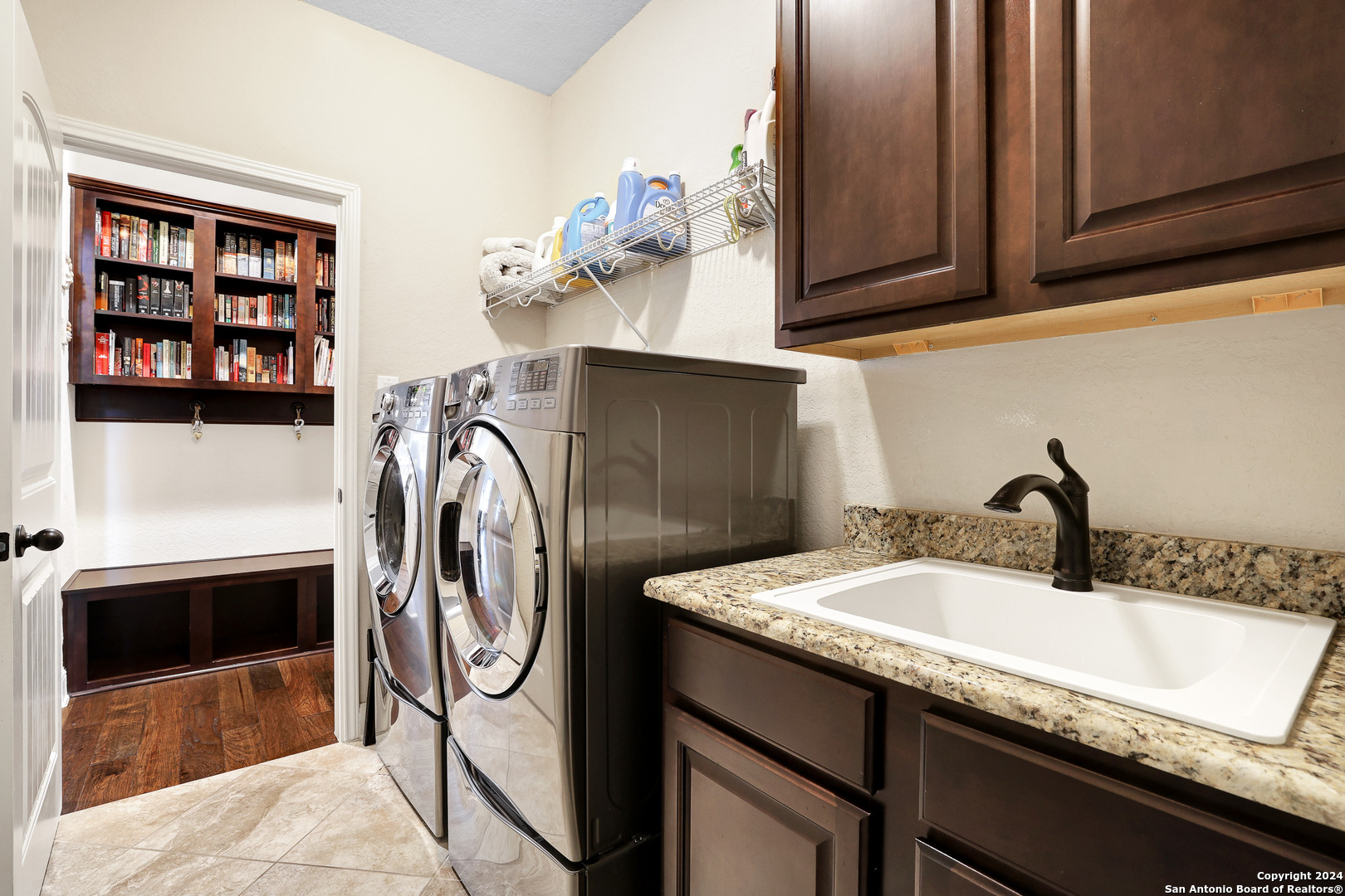 28565 Willis Ranch San Antonio, TX 78260 - Photo 29 of 39 a bathroom with a sink and a washing machine