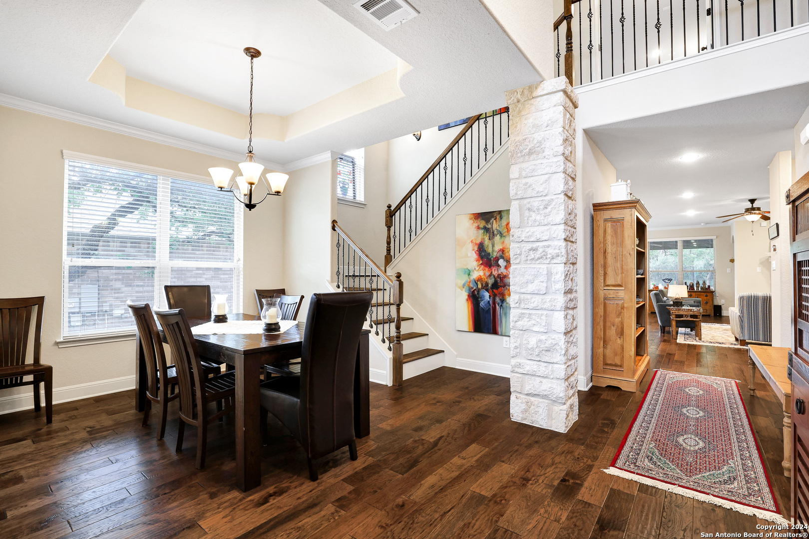 28565 Willis Ranch San Antonio, TX 78260 - Photo 5 of 39 a view of a dining room with furniture window and wooden floor